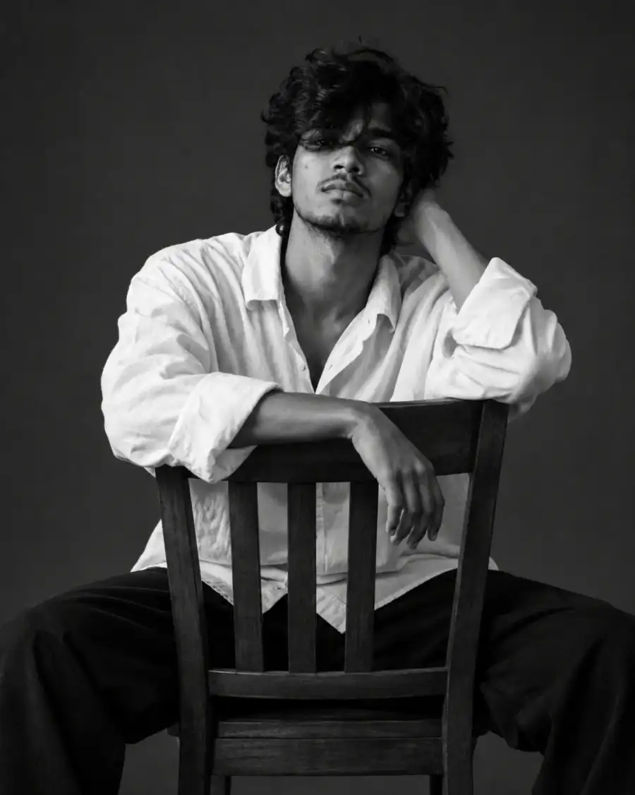 Chatgpt Boys Man Sitting On A Wooden Chair Prompts